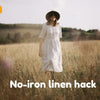 lady wearing linen dress in a filed