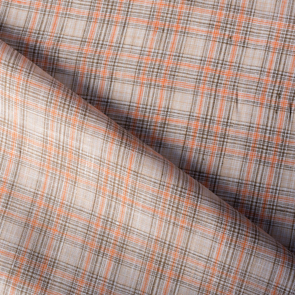Earthy plaid linen fabric with vivid pumpkin threads and natural texture, suitable for creating comfortable and stylish wardrobe staples.