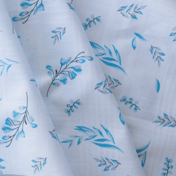Lightweight-medium weight Blue Botanical Breeze linen fabric with subtle plaid weave and blue floral prints