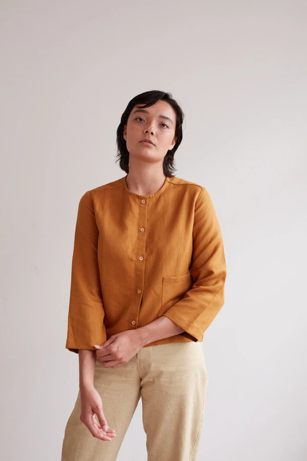 Frida Shirt PDF sewing pattern, a beginner-friendly design with a flat binding neckline, available in UK sizes 6-28, perfect for creating a versatile wardrobe staple.