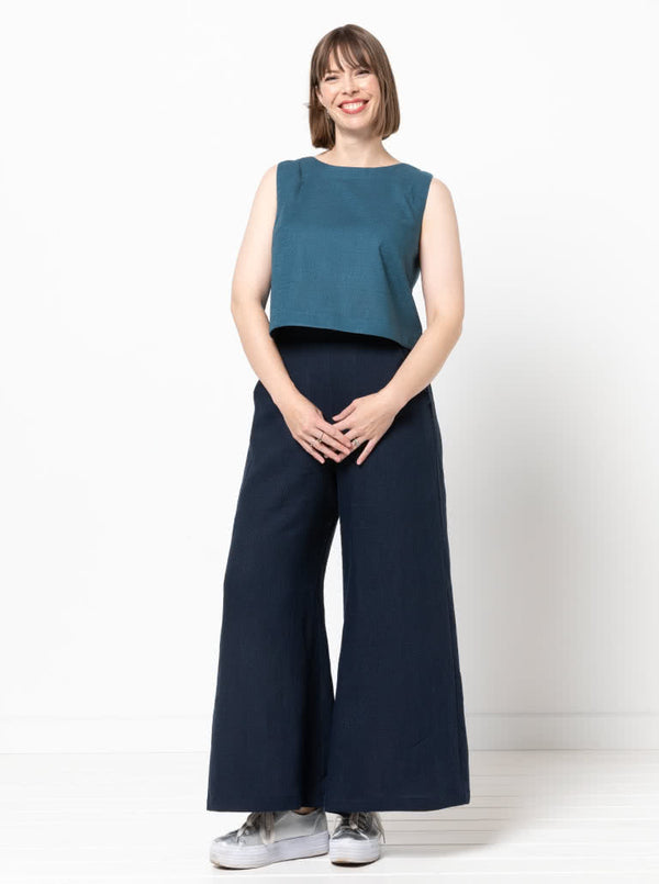 Loddon Woven Pant sewing pattern, featuring wide-leg, full-length pants with elastic waist, flat front waistband, and angled pockets, suitable for washed linen, crepe, viscose, or fine wool fabrics.