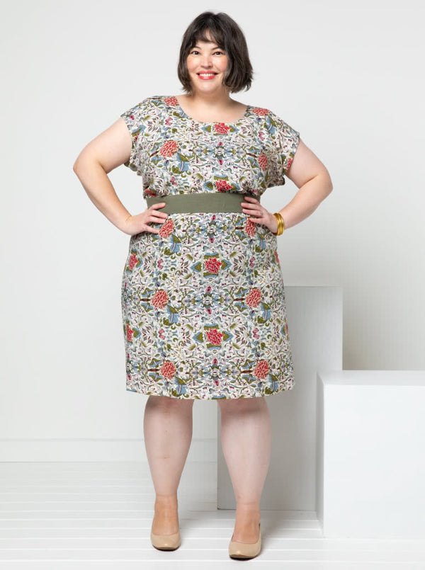 A stylish Olivia shift dress sewing pattern with an elastic waist and extended shoulder line, suitable for creating a versatile wardrobe essential.