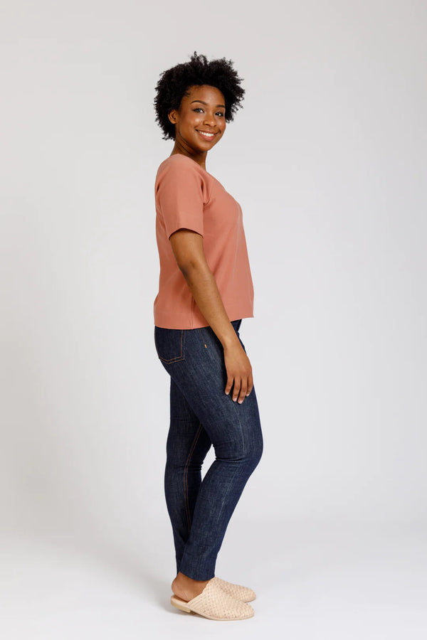 Multi-size reversible River Dress & Top sewing pattern, suitable for woven or knit fabrics, featuring a loose fit, optional pockets, and waist tie.