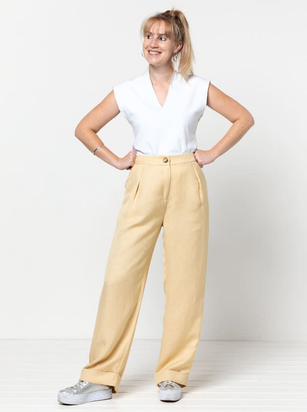 Spencer Woven Pant sewing pattern with wide leg design, cuffed hem, and detailed pockets, ideal for linen, wool, crepe, or gabardine fabrics.