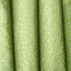 legant Sunny Lime Embroidered linen fabric with a chambray texture and green vine embroidery, ideal for sophisticated creations.