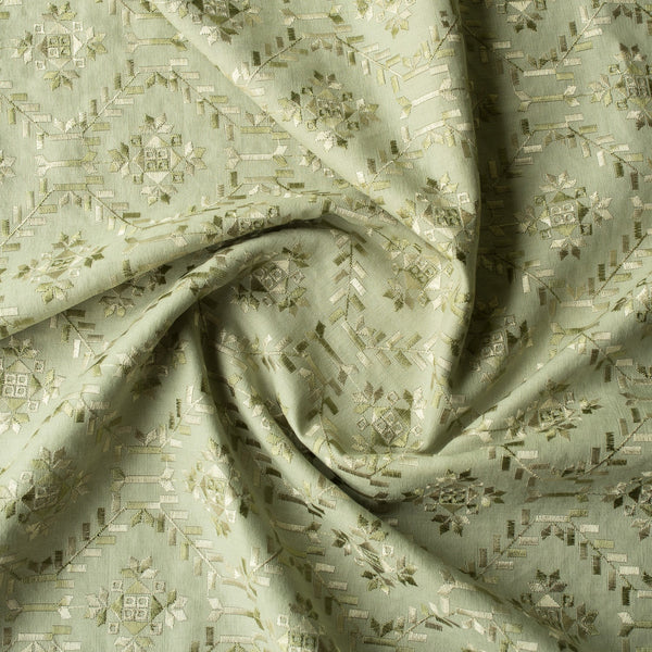 Elegant Urban Green Embroidered linen-cotton blend fabric with nature-inspired patterns, ideal for sophisticated and versatile creations.