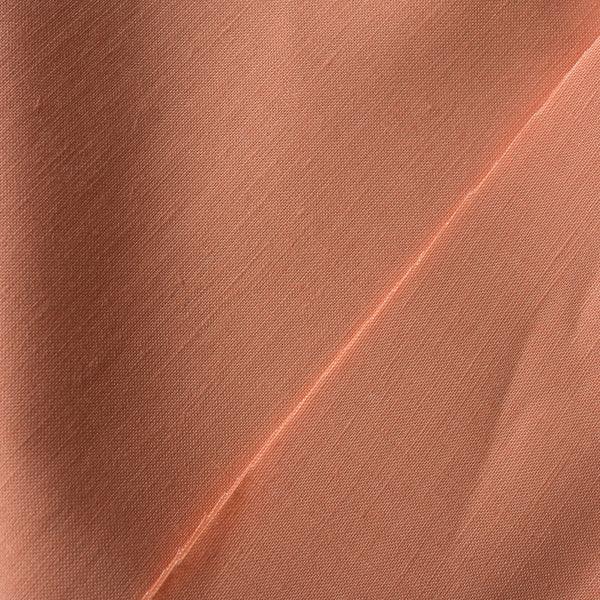 Apricot 100% Linen Fabric with a fine, close weave, smooth finish, and medium drape, perfect for heavyweight apparel creations.