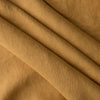 Close-up of Autumn Mustard extra wide 280cm 100% linen fabric 300gsm for jackets, aprons, cushions, curtains and structured home textiles with visible texture