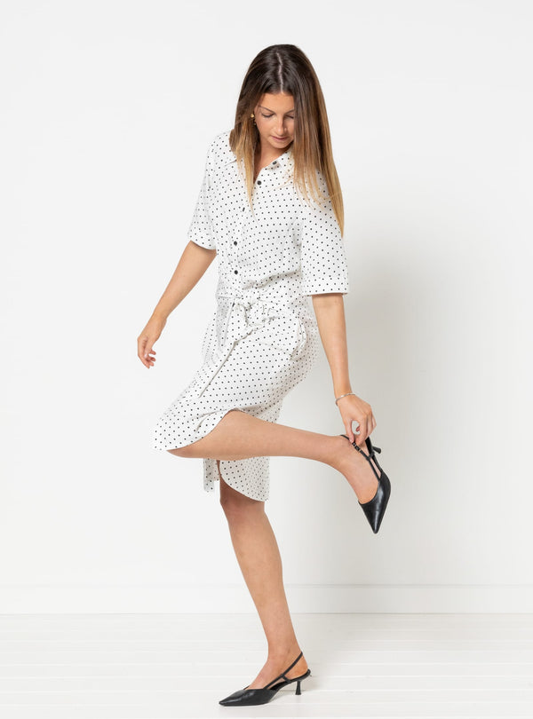 Woman wearing a white polka dot dress made using Avon Woven Shirt and Dress sewing pattern on a white background