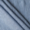 Close-up of Bluehaven Pinstripe linen fabric in pale blue with fine navy pinstripes, 100% linen, 140 GSM, 60 LEA yarn dyed