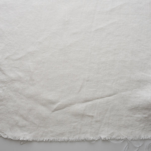 Close-up ofChalk White extra wide 280cm 100% linen fabric 300gsm for jackets, aprons, cushions, curtains and structured home textiles on a plain background