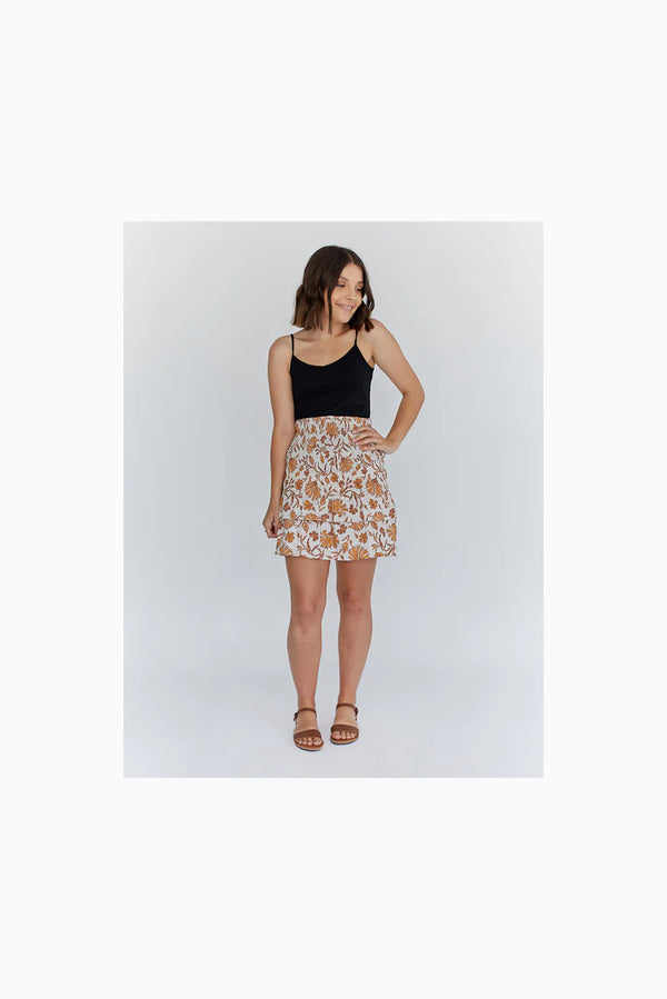 lady wearng skirt made using Fawn Skirt Set PAPER Pattern - Gathered Mini, Maxi, and Shirred Mini Skirt Patterns