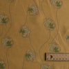 Golden Sketch Bloom linen fabric with golden mustard base and blue line-drawn floral design with green accent