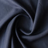 Ink navy linen fabric with visible yarn texture, slightly loose weave, suiting weight