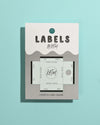 KATM acrylic label gauge on a light blue background