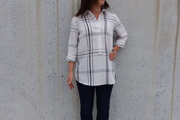 Lennie Over-Shirt sewing pattern, featuring a classic relaxed fit with a neat collar, ¾ front tab, and rolled-up sleeves secured with buttons, suitable for linen, crepe, cotton, or shirting weight fabrics.