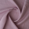 Close-up of Lilac extra wide 280cm 100% linen fabric 165gsm for dresses, shirts, skirts, relaxed pants, curtains and home textiles with folds