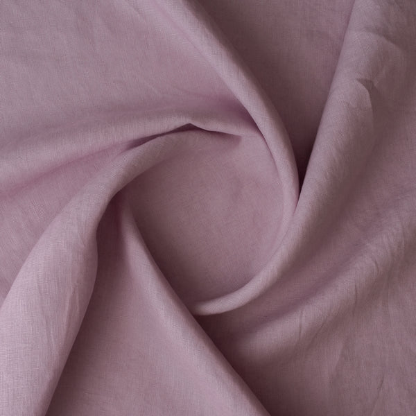 Close-up of Lilac extra wide 280cm 100% linen fabric 165gsm for dresses, shirts, skirts, relaxed pants, curtains and home textiles with folds