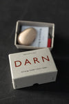 Merchant & Mills Darn Box with darning egg, scissors, needles, and threader for garment repair
