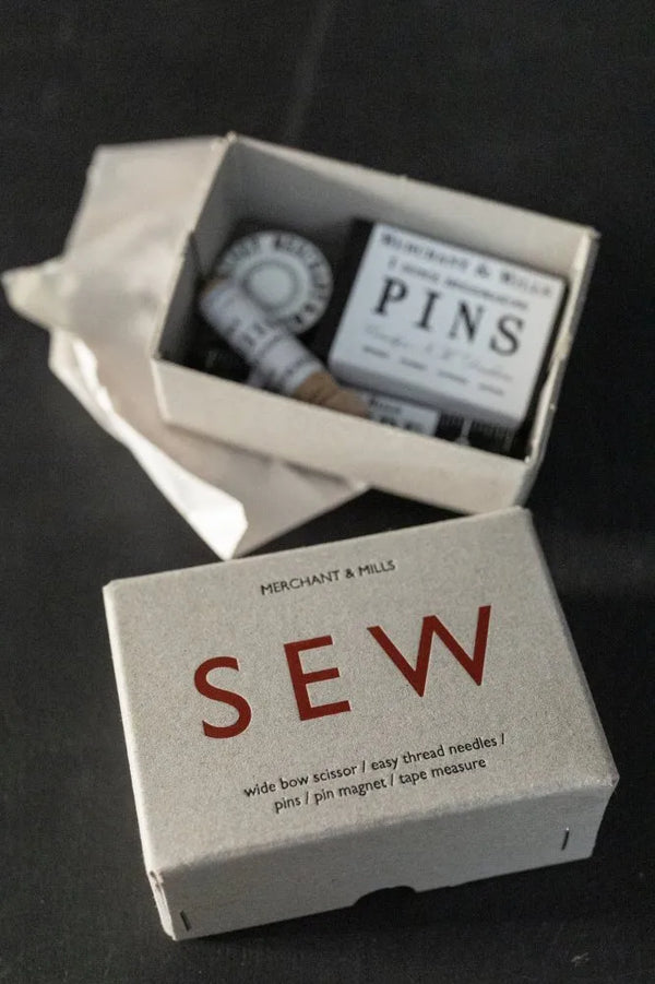 Merchant & Mills Sew Box with premium sewing essentials including scissors, pins, and tape measure