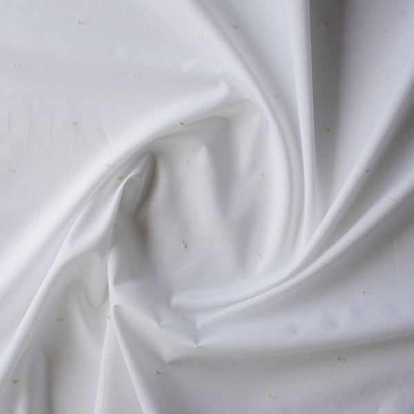 Pure White with Ivory Dot Giza Cotton Blend Fabric with small ivory embroidered dots on a white base