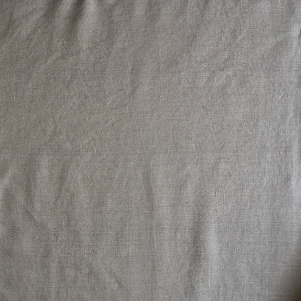Raw Trace extra wide heavyweight 100% linen fabric in natural flax tone with subtle darker thread variation for jackets and homewares