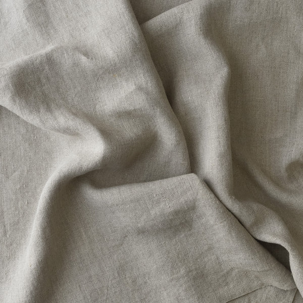 Raw Trace extra wide heavyweight 100% linen fabric in natural flax tone with subtle darker thread variation for jackets and homewares
