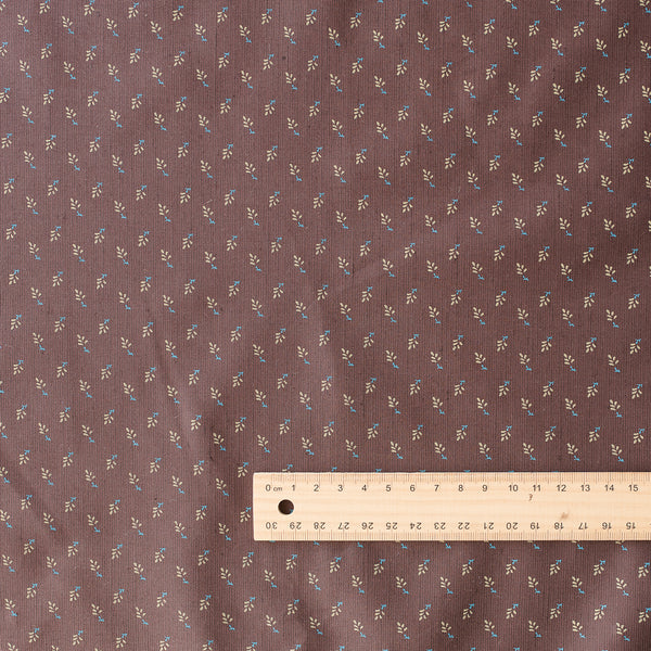 Rustic Meadow linen cotton blend fabric with brown base and green olive leaves and blue stems floral