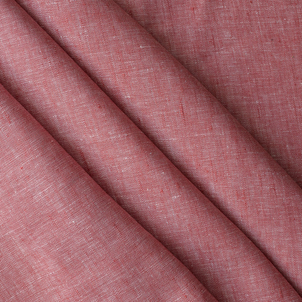 Close-up of Rustic Rose textured linen fabric in earthy rose-pink, 100% linen yarn dyed, 225 GSM, 25 LEA.