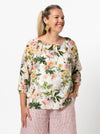 front view of Style Arc Anita Peasant Blouse Sewing Pattern with drawstring neck and raglan sleeves