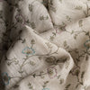 Wildflower Embroidered Linen Fabric – sheer 100% linen with floral threadwork and gold sequins on beige base