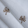Wintertree Embroidery — pure white linen–cotton fabric with dark golden embroidered tree motif, 44 LEA