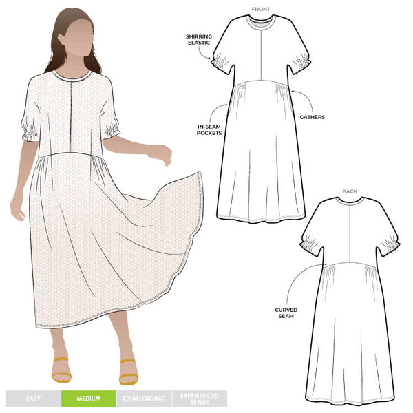 Elegant Eileen Dress pattern with shirred sleeve detail, gathered side waist, and round neckline, offering a blend of classic and modern style.