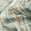 Lightweight linen-cotton blend fabric with scalloped, chevron, and striped patterns in green, yellow, maroon, and blue