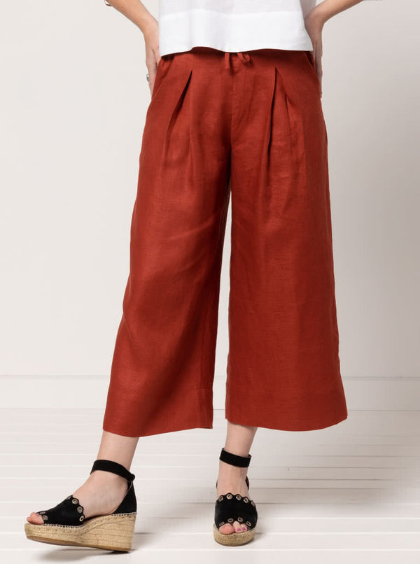 Milan woven pant sewing pattern featuring a wide leg, ankle length, and drawstring tie waist, designed for ultimate comfort in linen and cotton.