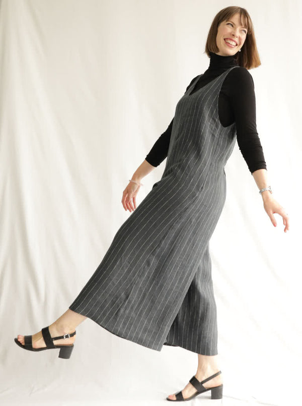 A comfortable Norman V-neck jumpsuit sewing pattern with deep armholes and wide legs, perfect for creating a chic and easy-to-wear garment.