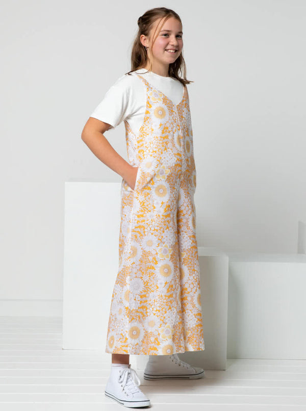 A fashionable Norman Teens jumpsuit sewing pattern with a “V” neck and wide legs, designed for comfort and style in teen sizes.