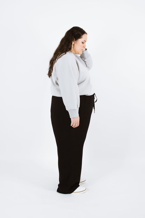 Stylish Pinnacle Curve Top/Sweater sewing pattern featuring a cropped oversized fit with two front triangle panels, available in variations with Deep V or Round necklines