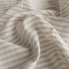 Timeless Sandalwood Stripes linen fabric in neutral tones, ideal for both fashion and home décor projects.