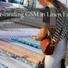lady selecting linen fabrics based on GSM