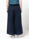 Loddon Woven Pant sewing pattern, featuring wide-leg, full-length pants with elastic waist, flat front waistband, and angled pockets, suitable for washed linen, crepe, viscose, or fine wool fabrics.