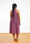 Austin Dress sewing pattern featuring a semi-fitted sleeveless design with a keyhole front, available in knee-length A-line or midi-length gathered skirt options.