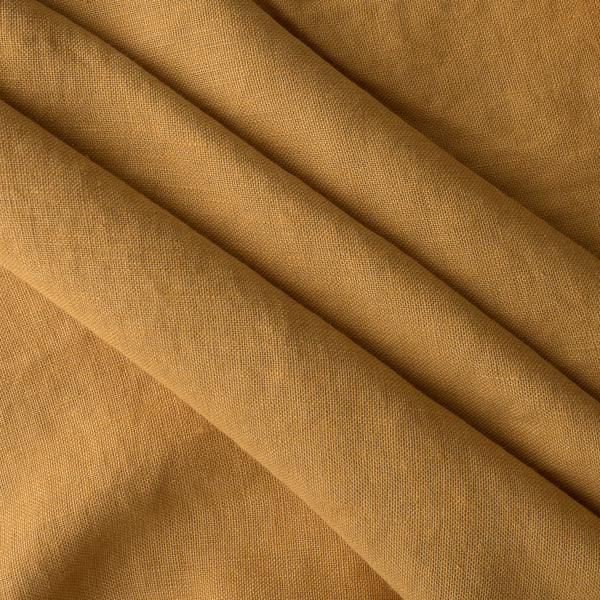 Close-up of Autumn Mustard extra wide 280cm 100% linen fabric 300gsm for jackets, aprons, cushions, curtains and structured home textiles with visible texture