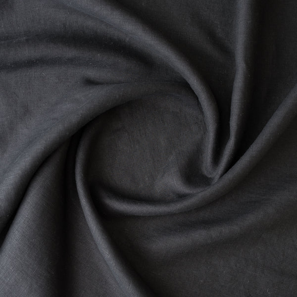 Close-up of Black extra wide 280cm 100% linen fabric 165gsm for dresses, shirts, skirts, relaxed pants, curtains and home textiles