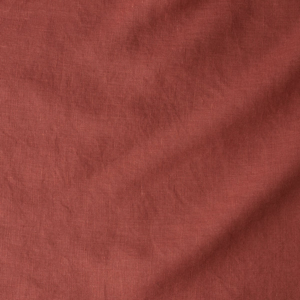 Close-up of a textured rust-colored fabric