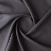 Close-up of dark gray fabric with folds