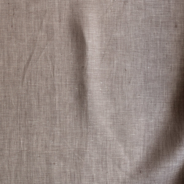 Earthbound Chambray Linen fabric in a warm taupe stone shade, 100% linen, 145 GSM with chambray texture — close-up weave detail