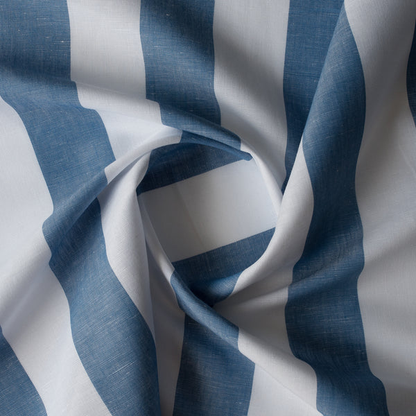 Close up of Marine Breeze Stripe linen–cotton fabric with jumbo blue and white yarn-dyed stripes, 135 GSM, 44 LEA