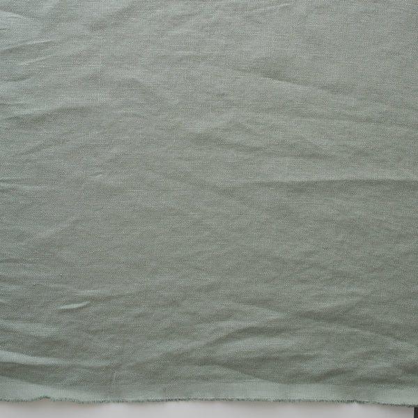 Close-up of Misty Sage extra wide 280cm 100% linen fabric 300gsm for jackets, aprons, cushions, curtains and structured home textiles fabric