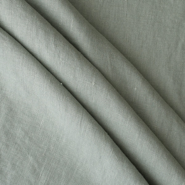 Close-up ofMisty Sage extra wide 280cm 100% linen fabric 300gsm for jackets, aprons, cushions, curtains and structured home textiles with folds